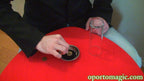 Coin through the cup